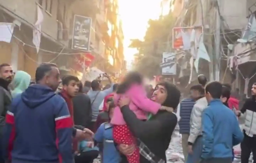 Thumbnail preview image for the video titled: Neighbors evacuate children and the bodies of those killed by Israeli bombing in Nuseirat