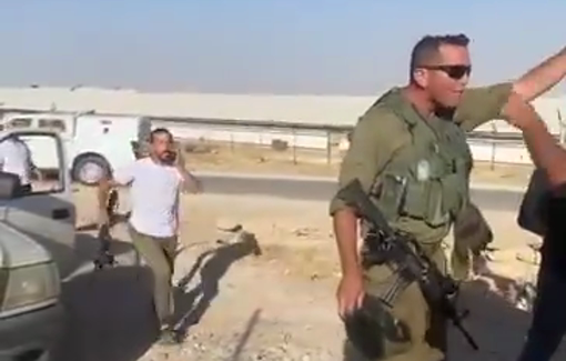 Thumbnail preview image for the video titled: Shimon Attia-led settlers, backed by soldiers, fired live rounds and tear gas in Umm al-Khair