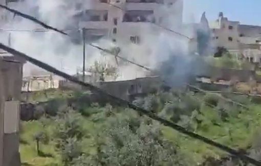 Thumbnail preview image for the video titled: Israeli forces firing tear gas canisters while sotrming Sa'ir