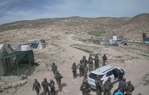 Thumbnail preview image for the video titled: Israeli soldiers arresting the resident of Jinba after being attacked by violent settlers protectiong them