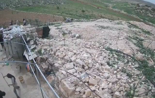 Thumbnail preview image for the video titled: In Jinba, Hilltop youth, masked, beat a 17-year-old boy, Kossai, with clubs, while his mother, Ala, screams in fear