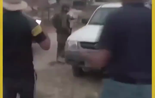 Thumbnail preview image for the video titled: Gangs of settlers under protection of Israeli soldiers attack Palestinians in Khirbet Umm al-Khair in Masafer Yatta