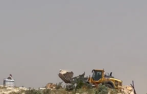 Thumbnail preview image for the video titled: Israeli forces destroying a water sources of the Jawaya farmers by pouring rocks in the citern