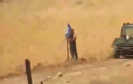 Thumbnail preview image for the video titled: Israeli settlers raised Israeli flags and roamed among Palestinian tents in Khirbet al-Samra