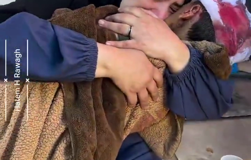 Thumbnail preview image for the video titled: Mother's last embrace of her child, killed in Israel's Abu Hamisa School massacre