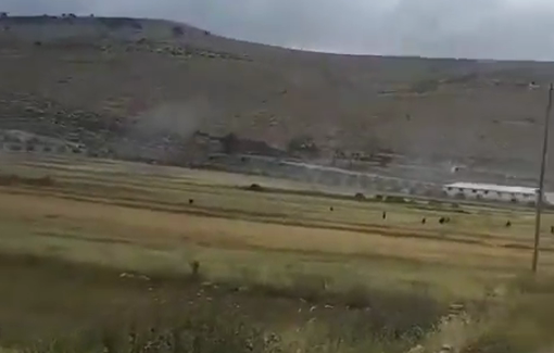 Thumbnail preview image for the video titled: Settler militias attacked the village of Al-Mughayyi under Israeli soldiers protection