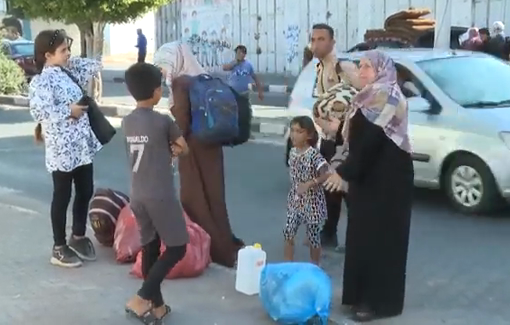Thumbnail preview image for the video titled: Palestinian families fleeing their homes in Gaza and taking shelter under Israeli intense shelling