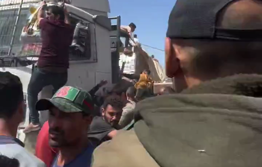 Thumbnail preview image for the video titled: Desperate for food, hundreds throng the first three aid trucks to enter northern Gaza in 80 days