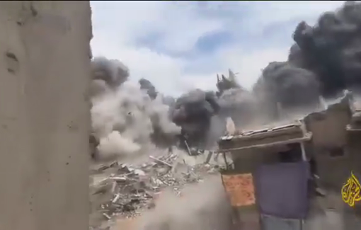 Thumbnail preview image for the video titled: Close view of violent Israeli detonations of buildings in Tal al-Zaatar