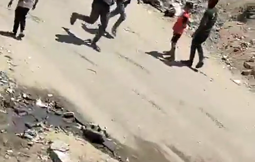 Thumbnail preview image for the video titled: Rushing a child injured in an Israeli strike on a group of people in Al-Nasr neighborhood
