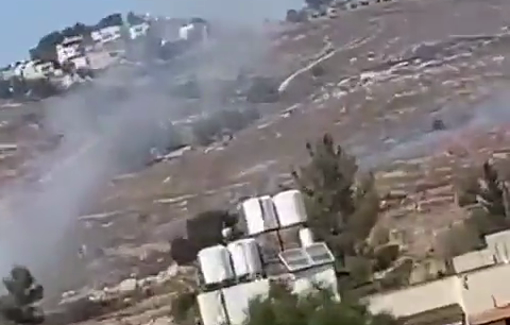 Thumbnail preview image for the video titled: Pogrom in Surif ; Israeli settlers injure eight and kill one resident after torching fields and homes