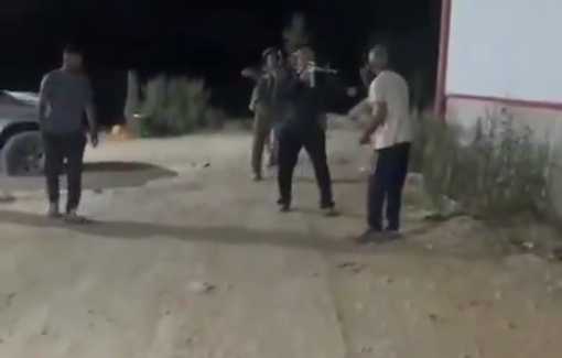 Thumbnail preview image for the video titled: Gadi Luski threatens Palestinian farmer with a weapon, while Shem Tov Luski repeatedly punches and kicks him