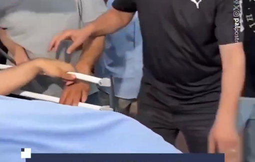 Thumbnail preview image for the video titled: A wounded Palestinian bids farewell to his brother, killed by settlers in Kaf Malik