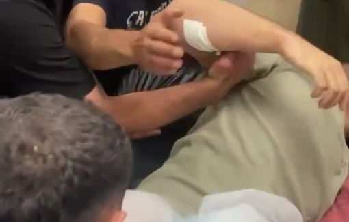 Thumbnail preview image for the video titled: A wounded Palestinian bids heartbreaking farewell to brother slain in Kafr Malik settler attack