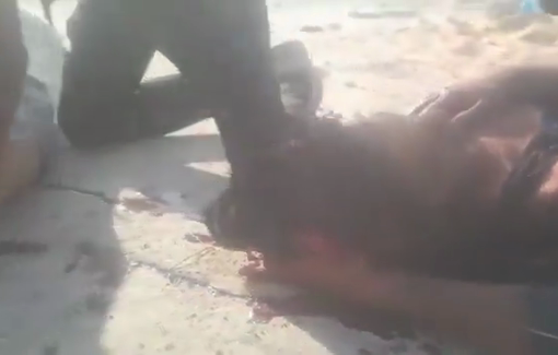 Thumbnail preview image for the video titled: Civilians try to tend young men shot at while seeking aid in northern Gaza