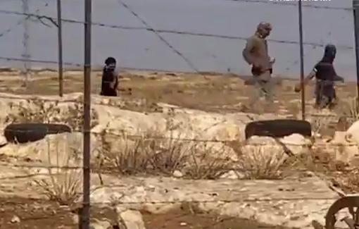 Thumbnail preview image for the video titled: Israeli terrorists, masked, invaded the village and attacked with severe violence the residents of Susiya