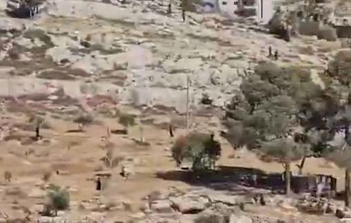 Thumbnail preview image for the video titled: Israeli settler militias backed by sodiers attacking the outskirts of the town of Surif in the southern West Bank