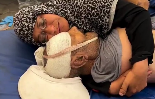 Thumbnail preview image for the video titled: Palestinian woman holds the body of her elderly husband, killed by Israel