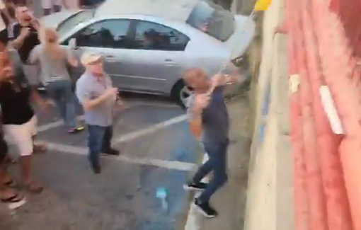 Thumbnail preview image for the video titled: Far-right activists continue throwing objects at MK Ayman Odeh as he prepares to give a speech in Ness Ziona