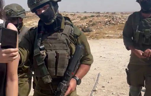 Thumbnail preview image for the video titled: Israeli soldiers prevented journalists from covering the mourning of Awdah Hathaleen, who was murdered by Ynon Levi