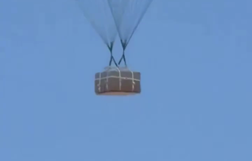 Thumbnail preview image for the video titled: Airdropped aid packages fall on tents in Gaza City