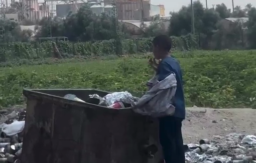 Thumbnail preview image for the video titled: Starved child eats from garbage bin