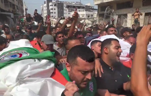 Thumbnail preview image for the video titled: Journalists and paramedics lead funeral procession of assassinated Al Jazeera crew