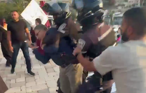 Thumbnail preview image for the video titled: Israeli police assault the Deputy Mayor of Umm al-Fahm City during a protest against Israeli assault on Gaza