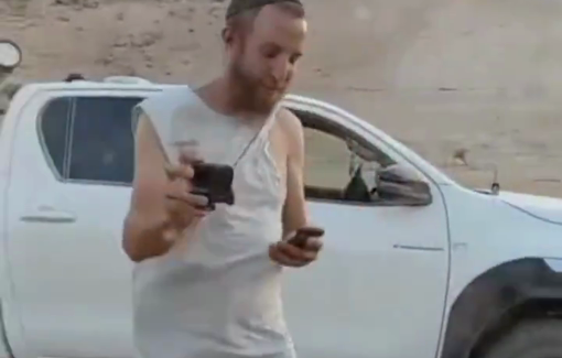 Thumbnail preview image for the video titled: An Israeli "security officer" with no legal power in al-Auja, terrorizing the area with a sadistic smile