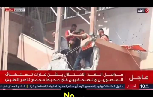 Thumbnail preview image for the video titled: Live footage of Israeli strike on rescue teams at Nasser hospital