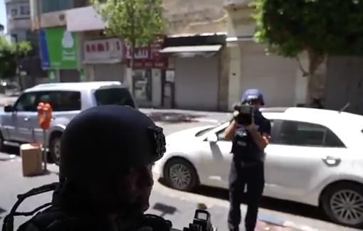 Thumbnail preview image for the video titled: Israeli soldier interviewed by AFP physically attacked the AP photographer Emad Esayyed during thei raid in Ramallah