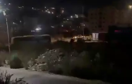 Thumbnail preview image for the video titled: The moment the Red Crescent crews received the body of Ahmed Abdel Fattah Shehadeh executed at the Al-Murabba'a checkpoint