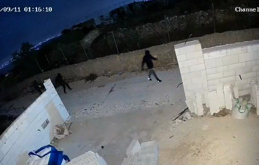 Thumbnail preview image for the video titled: Gangs of settlers invaded Atara, sprayed racist and inciting graffiti and set fire to a Palestinian car