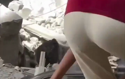 Thumbnail preview image for the video titled: Civilians dig with their bare hands to rescue children from the rubble