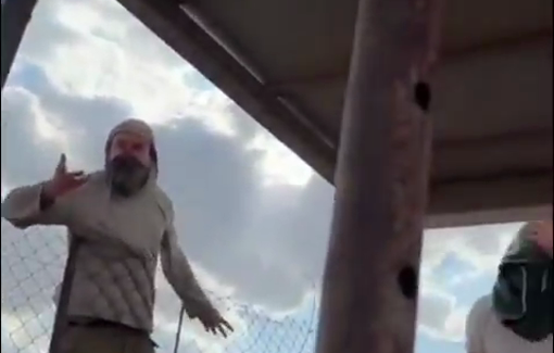 Thumbnail preview image for the video titled: Masked settlers pread terror in private Palestinian land, dressed in holiday clothes