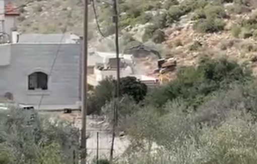 Thumbnail preview image for the video titled: Israeli Hyundai excavators demolishing three Palestinian homes in the town of Burqin