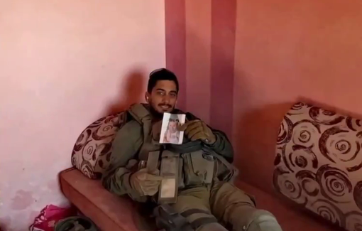 Thumbnail preview image for the video titled: A disturbed IDF soldier in Gaza Strip displays a crumpled photo of some little Plaestinian girl