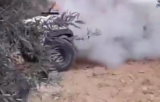 Thumbnail preview image for the video titled: Israeli settlers burn down Palestinian journalist vehicles during their attack on the village of Beita