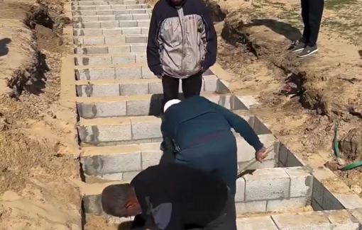 Thumbnail preview image for the video titled: A mass grave for around 100 Palestinians whose bodies were released by Israel in Rafah city
