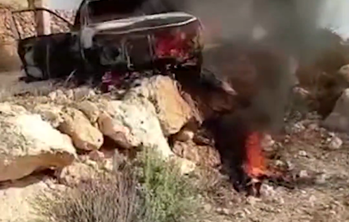 Thumbnail preview image for the video titled: Israeli settler militias torch two vehicles in attack on olive harvesters in Turmus Ayya
