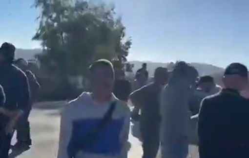 Thumbnail preview image for the video titled: Israeli soldiers blocking access of farmers to their farmland for harvesting olive in Turmus Ayya