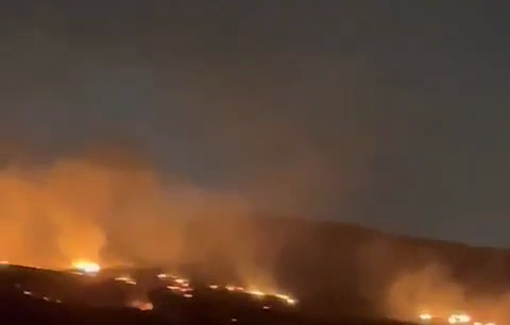Thumbnail preview image for the video titled: Israeli forces set fire to lands near the separation wall in the village of ‘Arbouna, east of Jenin.