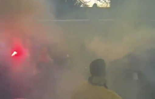 Thumbnail preview image for the video titled: In Sutttgart, Maccabi fans light up smoke bombs and sing "THE RAPE SONG"