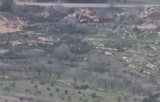 Thumbnail preview image for the video titled: Israeli settlers level Palestinian land in the Marj Arzel area, northwest of Sinjil