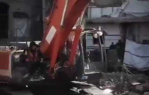 Thumbnail preview image for the video titled: Civil Defense retrieved bodies from a two-year-old massacre in Sheikh Radwan