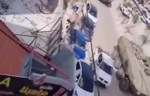 Thumbnail preview image for the video titled: Show of force with an Israeli convoy of military vehicles sweeping through Jenin
