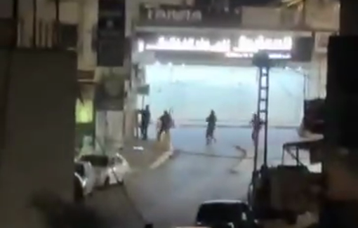 Thumbnail preview image for the video titled: Israeli forces arrested several Palestinian youths after invading a coffee shop near Dura in southern Hebron