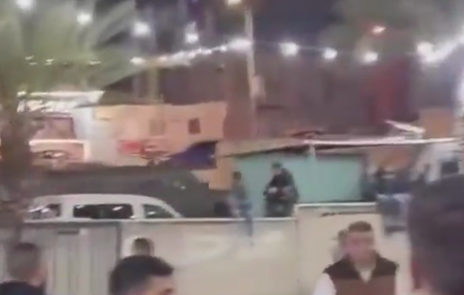 Thumbnail preview image for the video titled: Israeli Forces fired tear gas canisters at football players and spectators during a Ramadan tournament in the town of Ni’lin