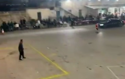 Thumbnail preview image for the video titled: A military jeep fires a tear gas canister into a mini football field where Palestinian teenagers are playing during the month of Ramadan in the village of Ni‘lin