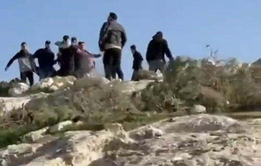 Thumbnail preview image for the video titled: Israeli settlers backed by soldiers carried a pogrom using clubs, stones and firearms killing the 19-year-old Nasrallah Abu Siam